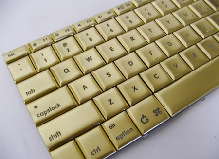 24-Carat Gold Macbook with Diamond Apple Logo