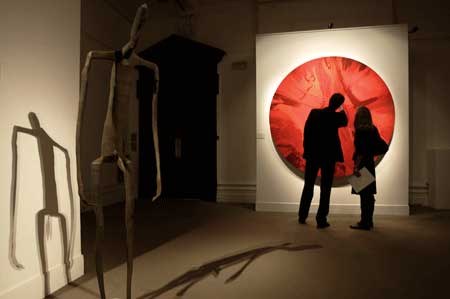 Damien Hirst, Bono Contribute AIDS Charity With $40 mn sale