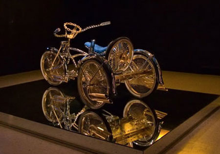 http://elitechoice.org/wp-content/uploads/2008/06/gold-lowrider-tricycle.jpg