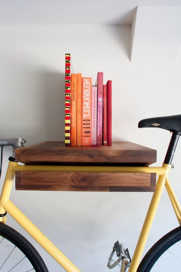 photo bikerack cu books A Bright New Idea: A Shelf That Can Hang Your Bike!